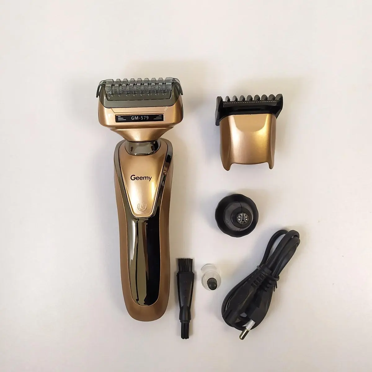 Бритва триммер 3 в 1 Geemy GM-579 на акумуляторі універсальна з насадками для стрижки бороди носа вух - Зображення 6