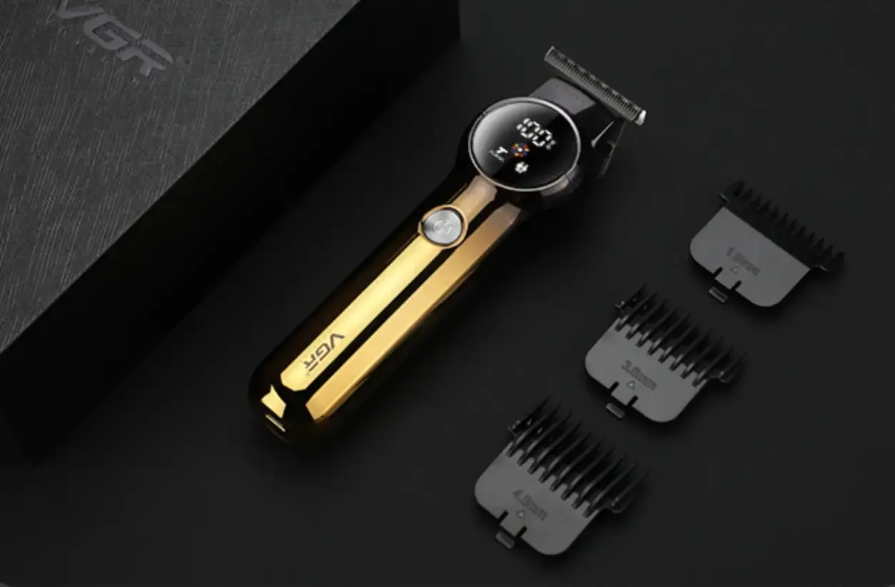 Акумуляторна машинка для стрижки VGR V-989 від USB з 3 насадками - Зображення 3