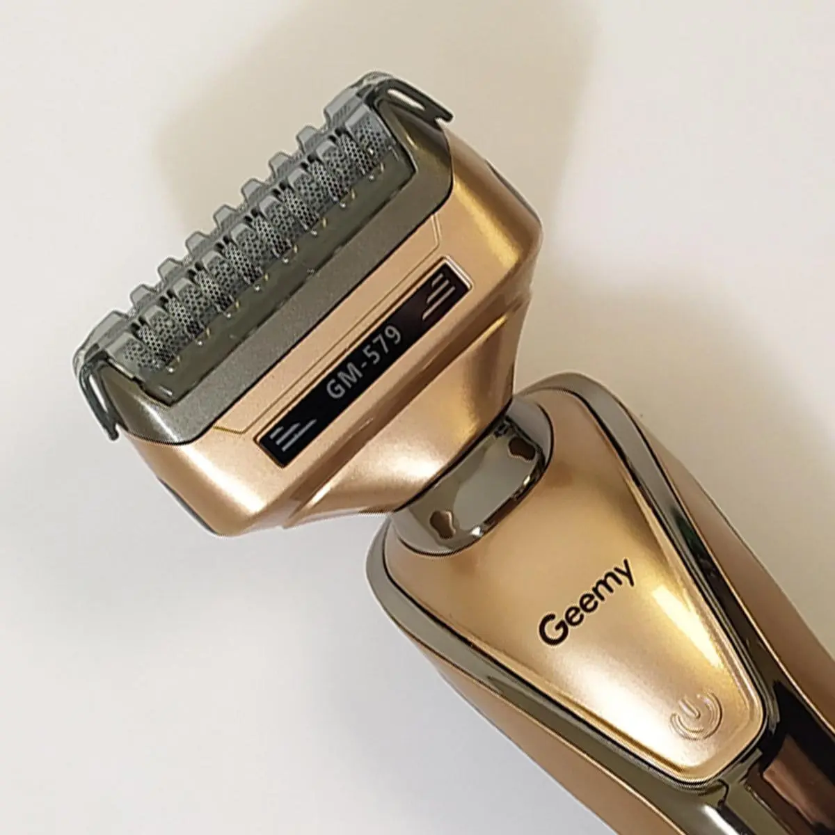 Бритва триммер 3 в 1 Geemy GM-579 на акумуляторі універсальна з насадками для стрижки бороди носа вух - Зображення 7