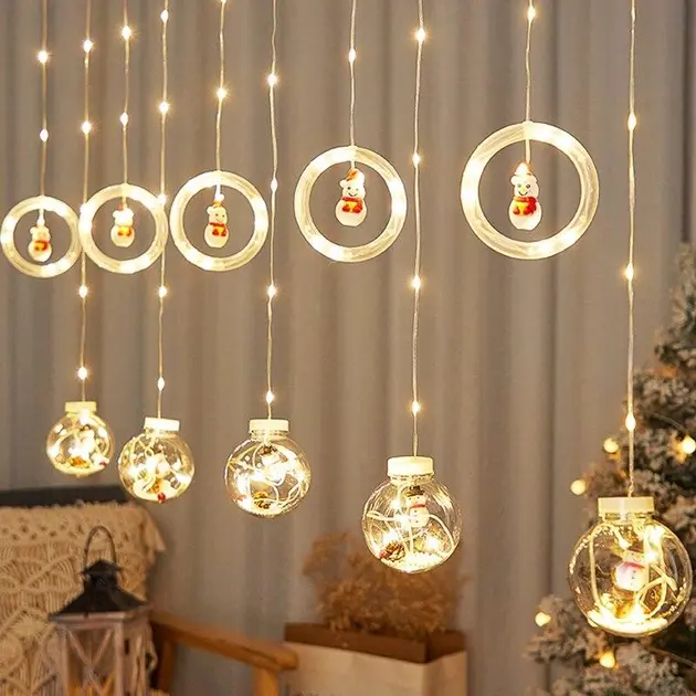 Гірлянда штора 3м з теплим жовтим світінням "Круги та кулі" ялинка, сніговик, дід мороз, олень, шапка SF-50 - Зображення 3