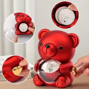 Скринька-ведмідь, що обертається, з трояндою в колбі